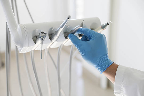 Professional Emergency Dentist technician working in Harrisonville, MO